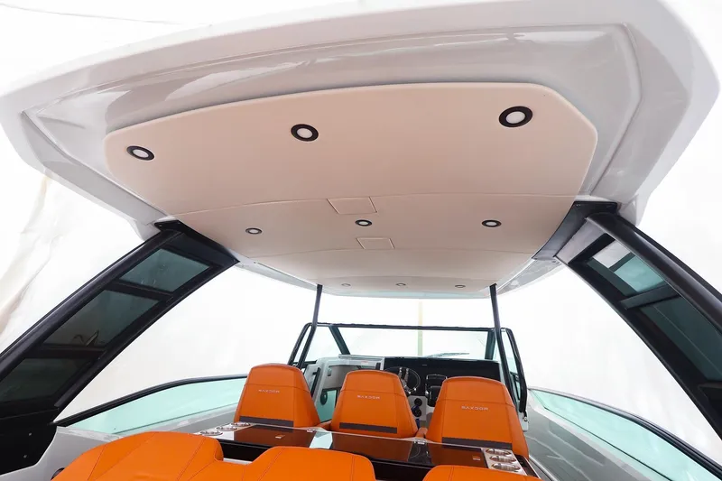 Slide: The Image of 2023 Saxdor 320 GTO interior with orange seats and modern design. - 25