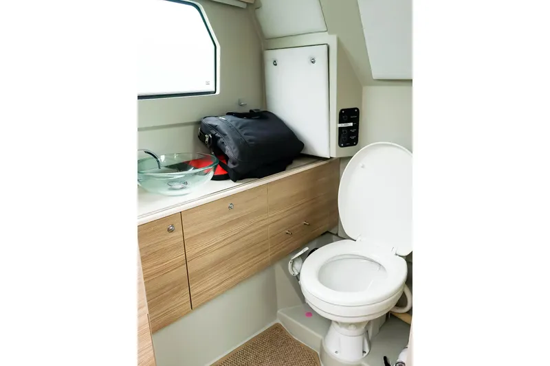 Slide: The Image of 2023 Saxdor 320 GTO boat bathroom with modern sink and toilet. - 29