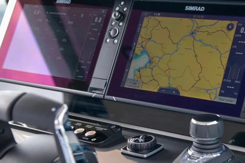 Slide: The Image of Simrad navigation system on 2023 Saxdor 320 GTO boat dashboard. - 5