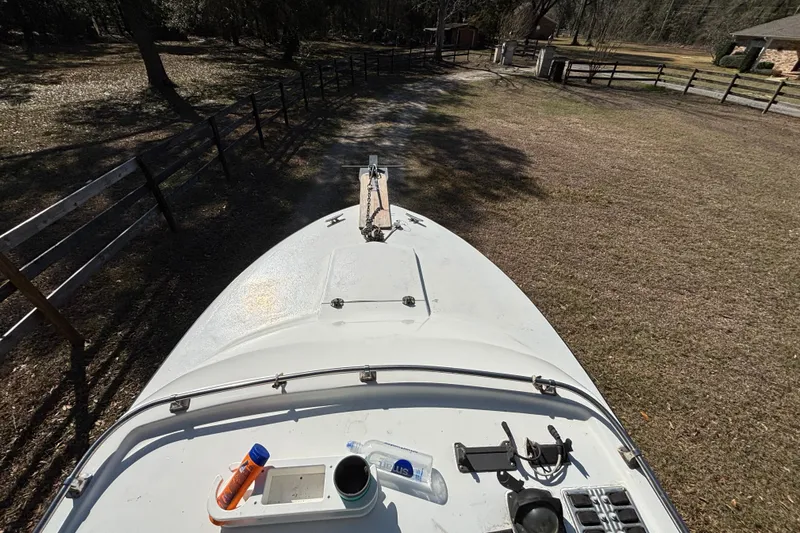 Slide: The Image of Dashboard of a 1965 Bertram 20 Bahia Mar boat with gauges and steering wheel. - 6