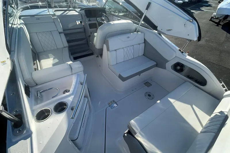 Slide: The Image of 2024 Regal 28 Express boat interior with luxurious seating and modern amenities. - 29