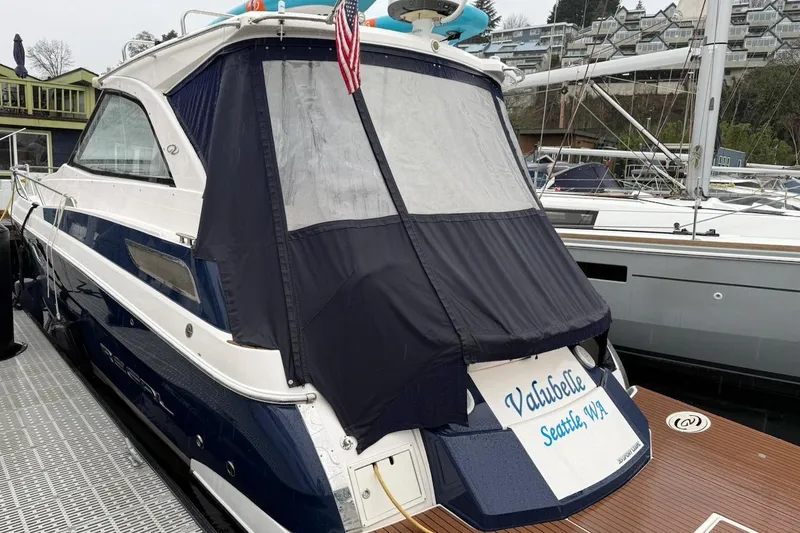 Slide: The Image of 2012 Regal 35 Sport Coupe docked, covered, with "Valubelle" nameplate, Seattle, WA. - 4