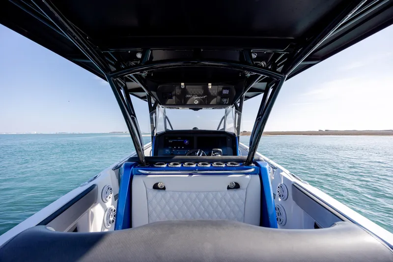 Slide: The Image of 2020 Nor-Tech 390 Sport Center Console boat interior on open water. - 31
