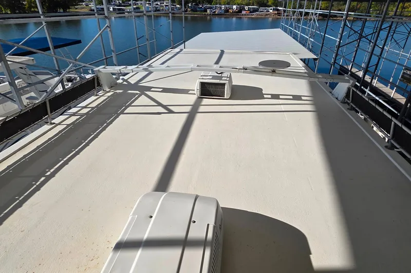 Slide: The Image of Rooftop view of 1999 Stardust Cruisers 16x60 houseboat with air conditioning units. - 19