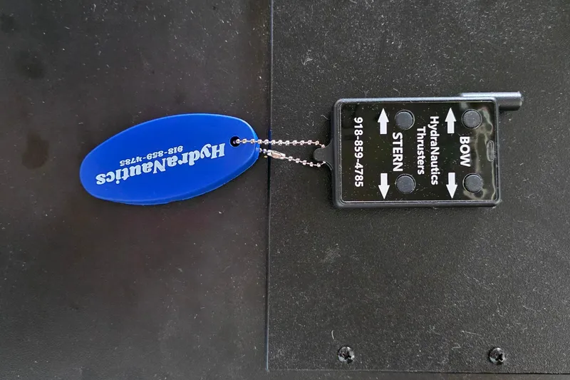 Slide: The Image of Remote control for HydraNautics thrusters with keychain, Stardust Cruisers 16x60, 1999 model. - 66