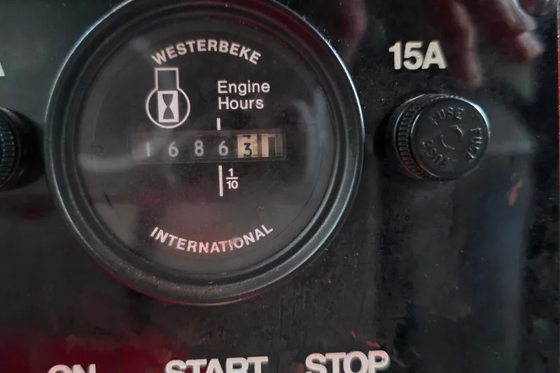 Slide: The Image of Westerbeke engine hour meter showing 1686.3 hours on a 1999 Stardust Cruisers 16x60. - 71