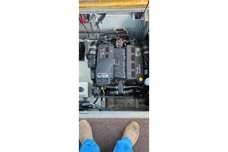 Slide: The Image of Engine compartment of a 1999 Stardust Cruisers 16x60 houseboat with MerCruiser V8 engine. - 73