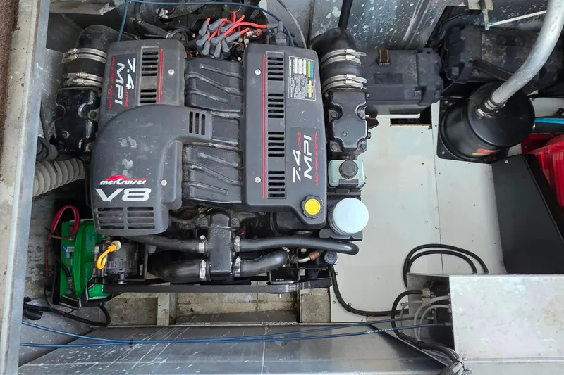 Slide: The Image of Engine compartment of a 1999 Stardust Cruisers 16x60 with MerCruiser V8 7.4 MPI engine. - 75