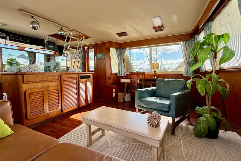 Slide: The Image of Luxurious 1987 Chris-Craft 500 Constellation yacht interior with elegant wood finishes and modern decor. - 30