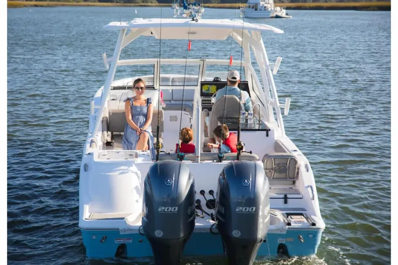 Slide: The Image of 2026 Sea Fox 268 Traveler boat interior with white seating and blue LED lighting. - 4