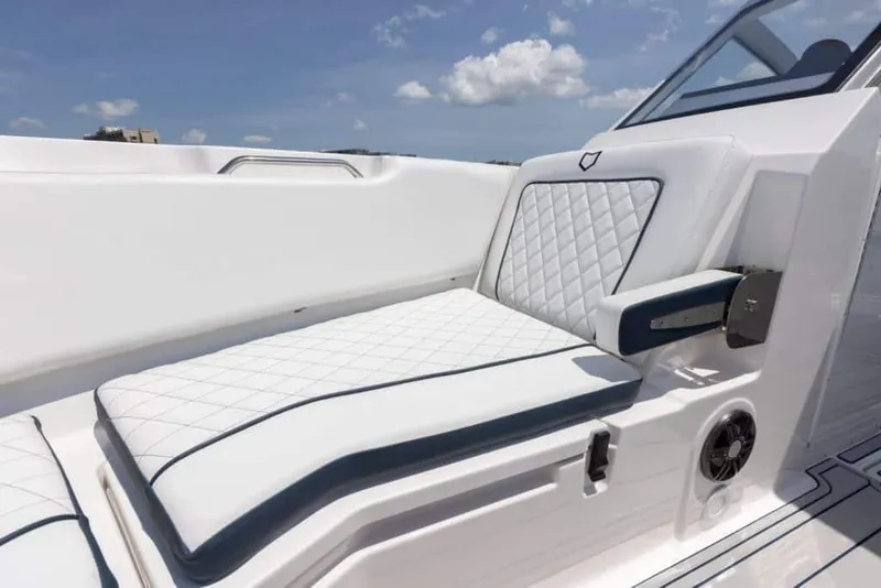Slide: The Image of 2026 Sea Fox 268 Traveler boat interior with white cushioned seating and modern design. - 7
