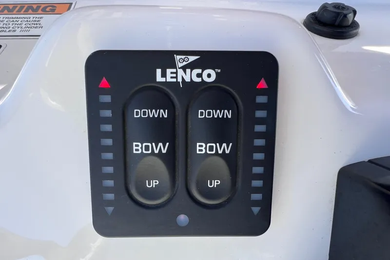 Slide: The Image of Lenco trim tab control panel on 2021 NauticStar 227 XTS boat. - 35