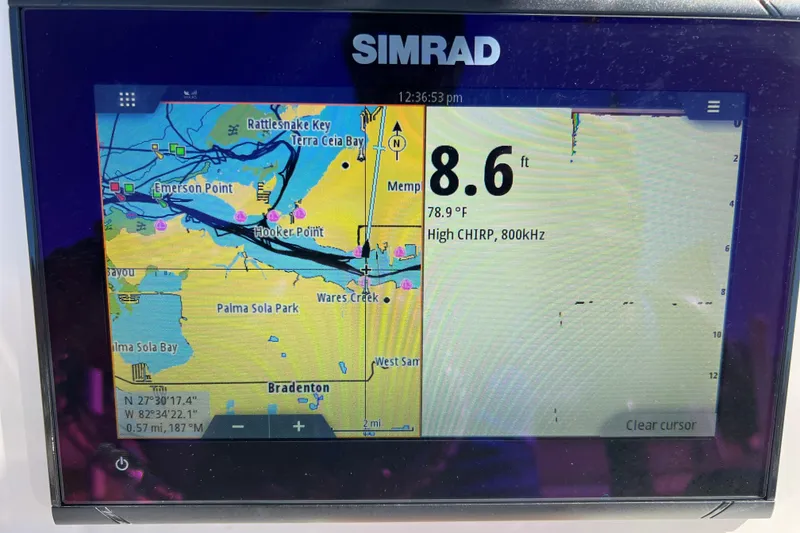 Slide: The Image of Simrad marine GPS display on 2021 NauticStar 227 XTS showing depth and map. - 39