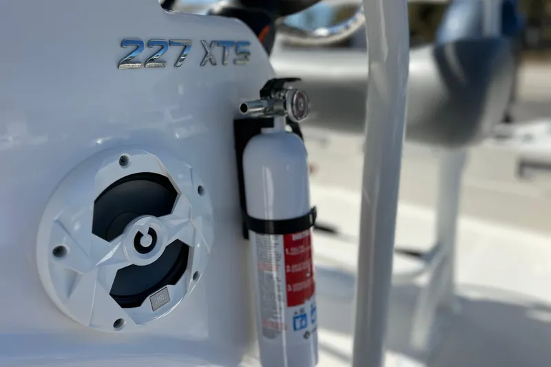 Slide: The Image of 2021 NauticStar 227 XTS boat with speaker and fire extinguisher detail. - 41