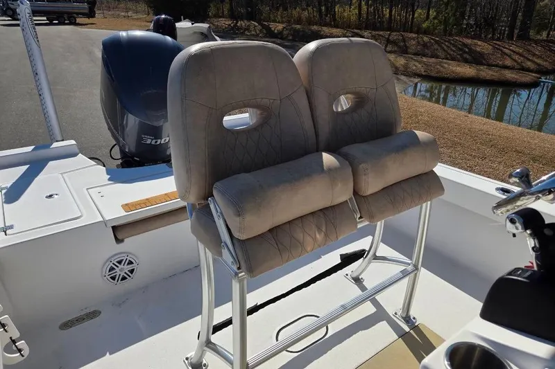 Slide: The Image of 2019 Sportsman Masters 247 Bay Boat with dual cushioned seats and Yamaha 300 engine. - 13