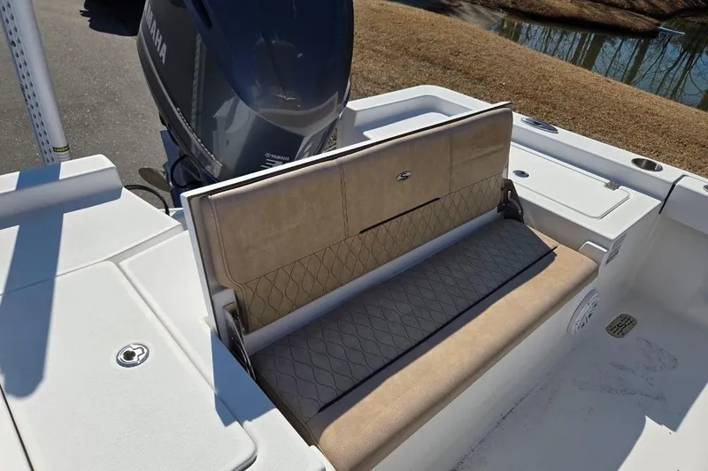 Slide: The Image of 2019 Sportsman Masters 247 Bay Boat with Yamaha engine and cushioned seating. - 16