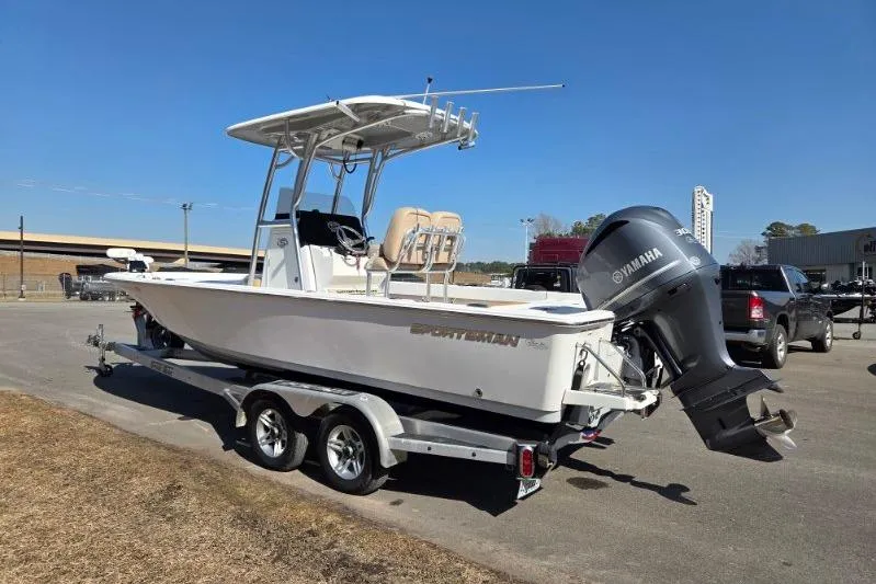 Slide: The Image of 2019 Sportsman Masters 247 Bay Boat on trailer, featuring Yamaha outboard motor. - 5