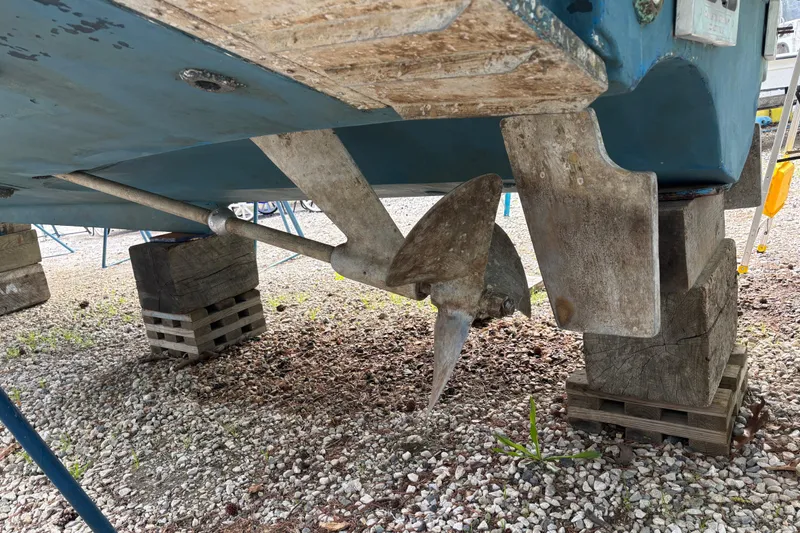 Slide: The Image of 2005 Tiara Yachts 3600 Open propeller and rudder on dry dock. - 33