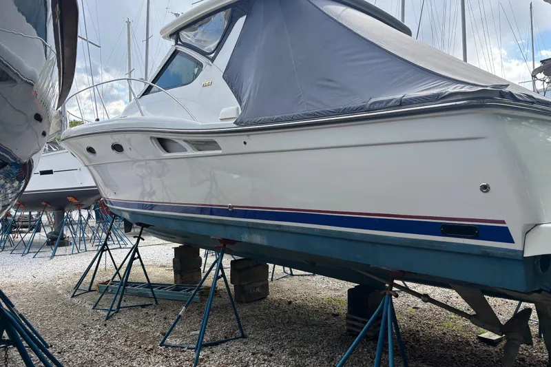 Slide: The Image of 2005 Tiara Yachts 3600 Open on stands in a boatyard. - 35