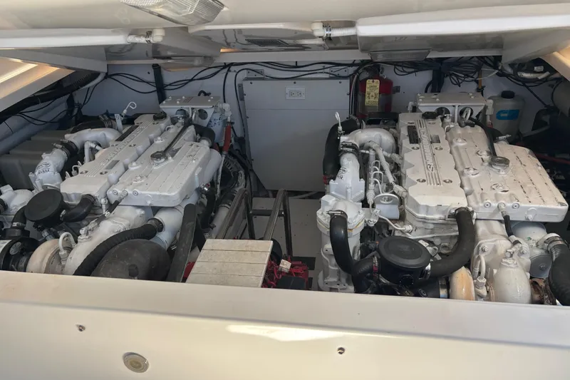 Slide: The Image of Engine room of a 2005 Tiara Yachts 3600 Open, showcasing dual engines. - 41