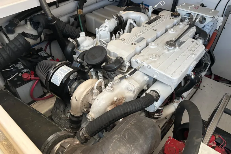 Slide: The Image of Engine compartment of a 2005 Tiara Yachts 3600 Open, showcasing detailed mechanical components. - 44