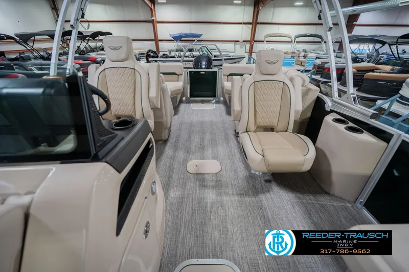 Slide: The Image of Interior of 2026 Bennington 24 MFB boat with luxurious seating and modern design. - 16