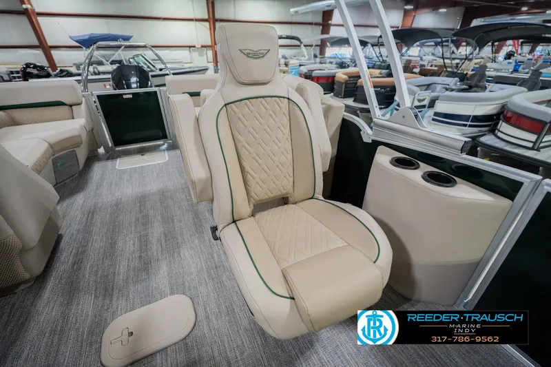 Slide: The Image of Luxurious interior of 2026 Bennington 24 MFB pontoon boat with plush seating. - 28