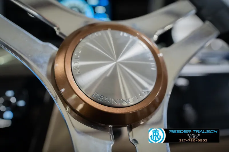 Slide: The Image of Steering wheel of 2026 Bennington 24 MFB boat with metallic finish and logo. - 34