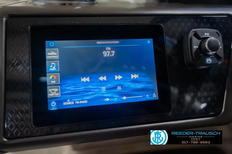 Slide: The Image of Touchscreen control panel of 2026 Bennington 24 MFB boat, displaying FM radio settings. - 35