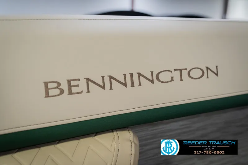 Slide: The Image of 2026 Bennington 24 MFB boat seat with logo, Reeder Trausch Marine contact details. - 41