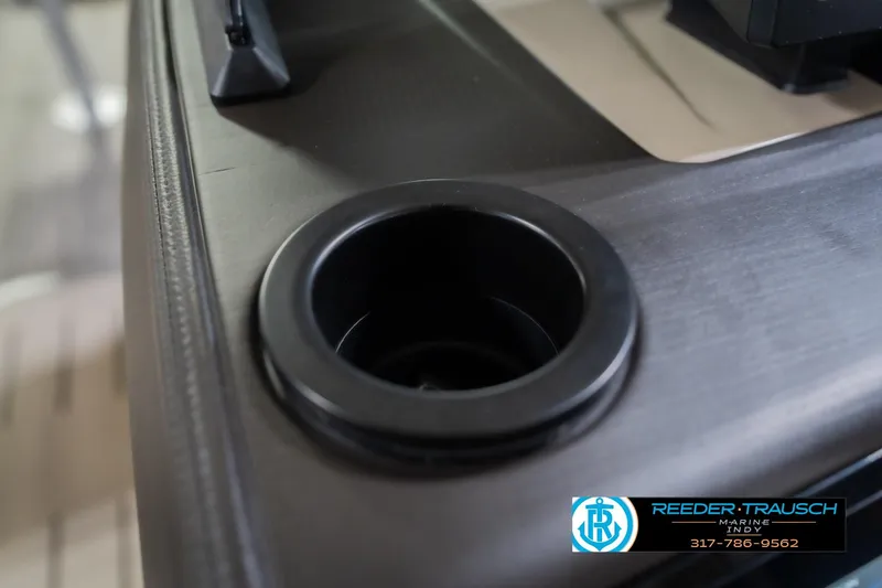 Slide: The Image of Cup holder on 2026 Bennington 24 MFB boat, featuring Reeder-Trausch Marine logo. - 47