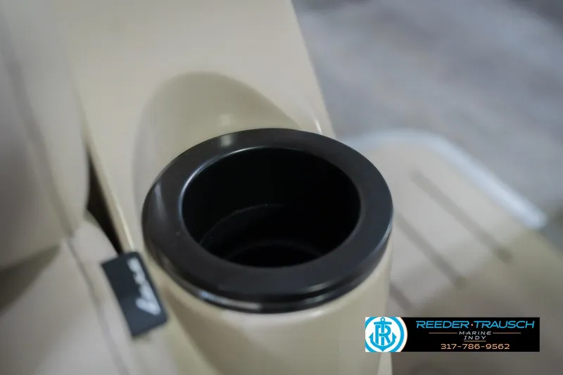 Slide: The Image of Cup holder in 2026 Bennington 24 MFB boat, featuring beige interior. - 48