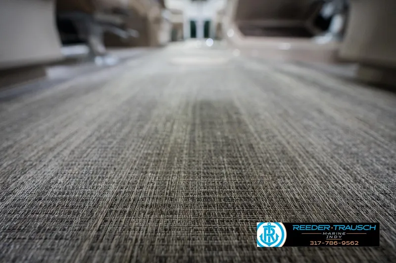 Slide: The Image of Close-up of 2026 Bennington 24 MFB boat flooring, showcasing textured surface detail. - 50