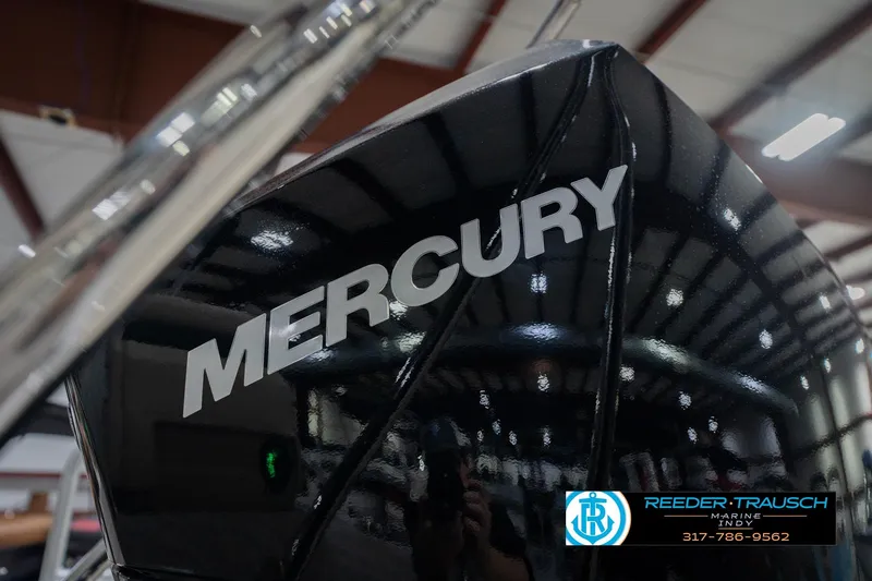 Slide: The Image of Close-up of a Mercury engine on a 2026 Bennington 24 MFB boat. - 52