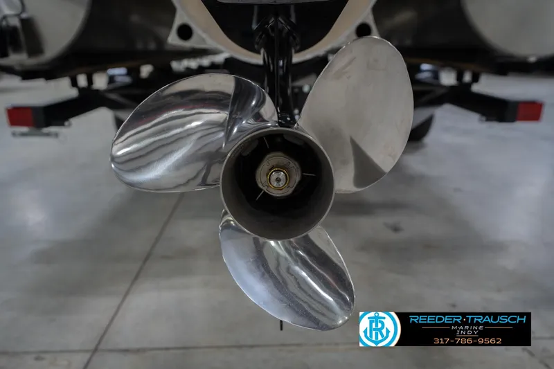 Slide: The Image of Close-up of a 2026 Bennington 24 MFB boat propeller in a showroom. - 54