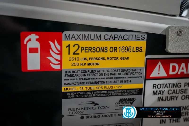 Slide: The Image of Capacity label on 2026 Bennington 24 MFB boat, 12 persons or 1696 lbs limit. - 63