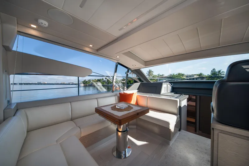 Slide: The Image of Luxurious interior of 2019 Filippetti S55 yacht with elegant seating and scenic water view. - 17