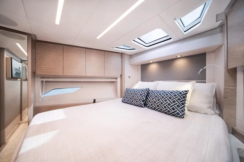 Slide: The Image of Luxurious 2019 Filippetti S55 yacht bedroom with modern design and skylights. - 27