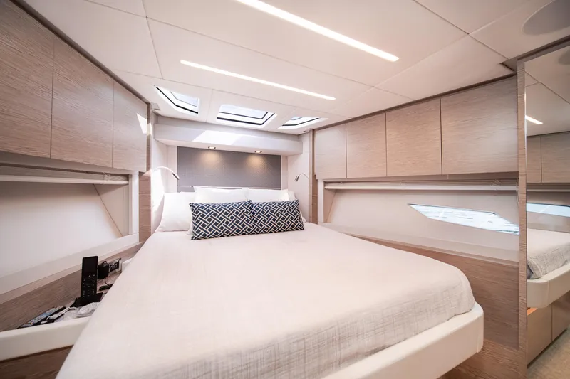 Slide: The Image of Luxurious bedroom interior of 2019 Filippetti S55 yacht with modern design and skylights. - 28