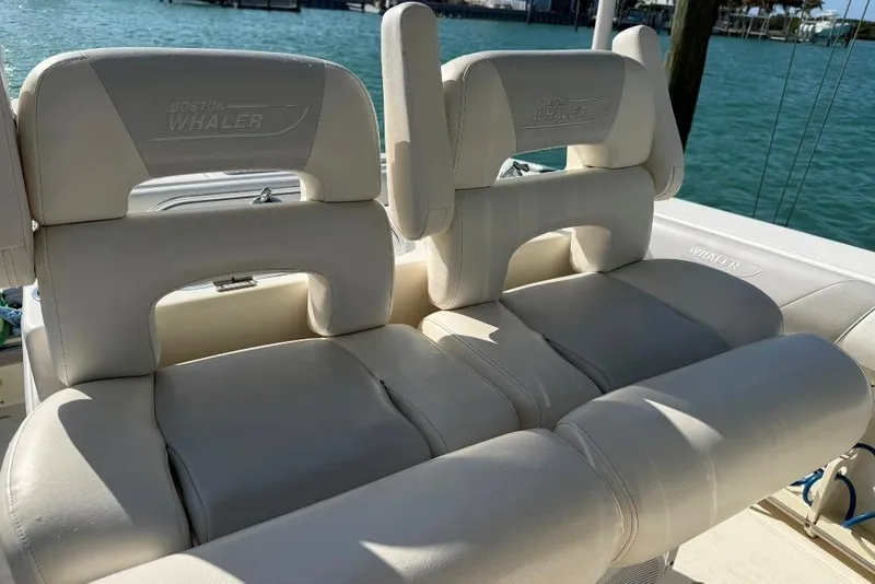 Slide: The Image of 2012 Boston Whaler 250 Outrage boat seats with ocean backdrop. - 18