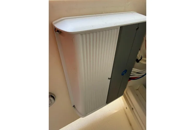 Slide: The Image of Electrical panel inside a 2012 Boston Whaler 250 Outrage boat. - 19