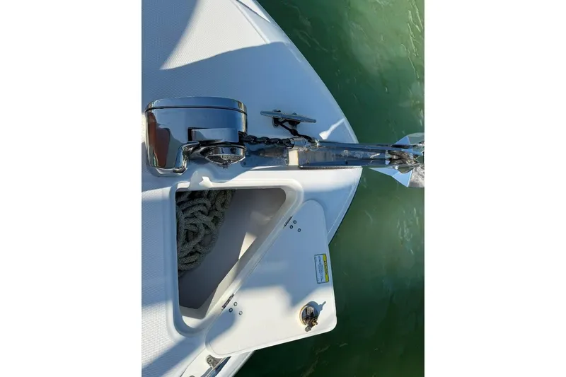 Slide: The Image of Bow of 2012 Boston Whaler 250 Outrage with anchor and rope storage. - 4