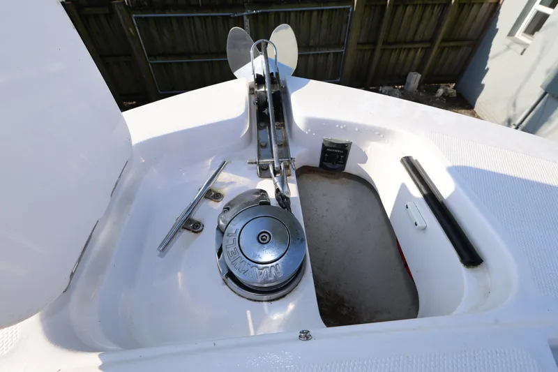 Slide: The Image of 2023 Bertram 28 CC boat anchor system with Maxwell winch and cleat. - 19