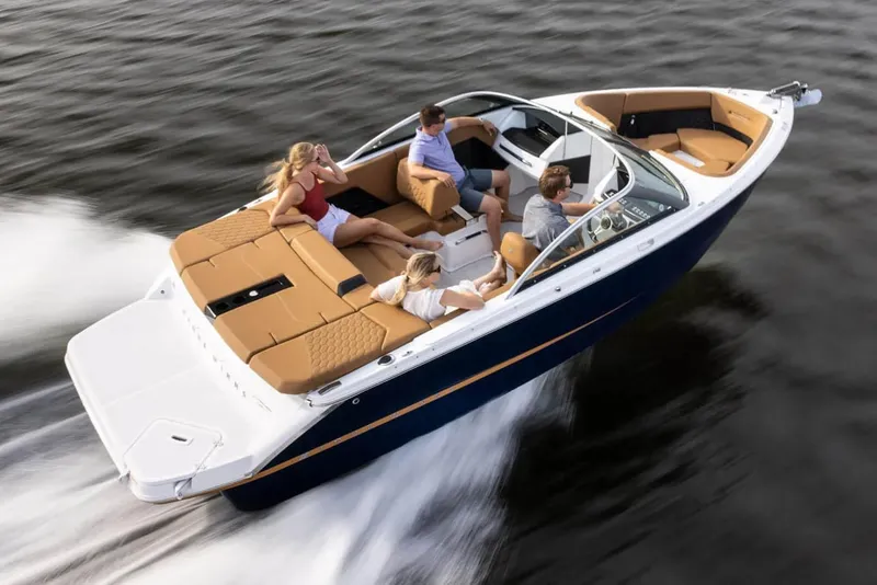 Slide: The Image of Manufacturer Provided Image: 2025 Four Winns H2 boat cruising with passengers on a sunny day. - 5