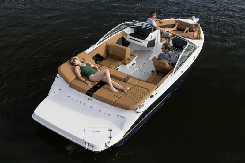 Slide: The Image of Manufacturer Provided Image: 2025 Four Winns H2 boat with passengers relaxing on water. - 6