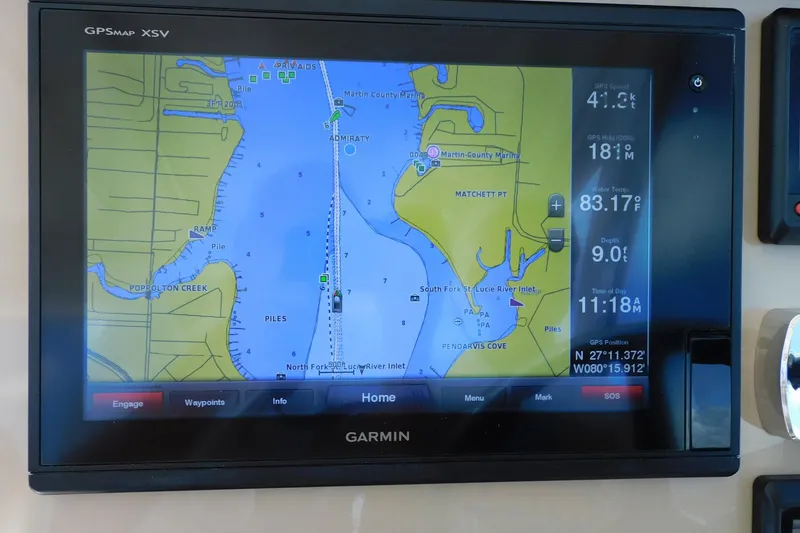 Slide: The Image of Garmin GPS display on 2016 Pursuit DC 325 Dual Console, showing navigation map and data. - 18