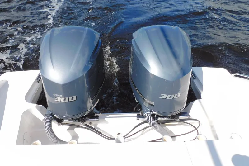 Slide: The Image of Twin Yamaha 300 engines on a 2016 Pursuit DC 325 Dual Console boat. - 37