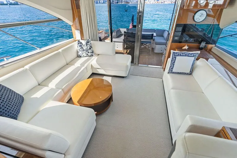 Slide: The Image of Luxurious interior of 2016 Princess 60 Flybridge Motor Yacht with elegant seating and ocean view. - 17