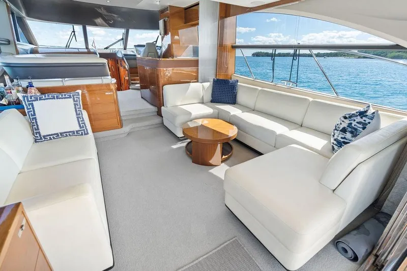 Slide: The Image of Luxurious interior of 2016 Princess 60 Flybridge Motor Yacht with elegant seating and ocean view. - 29