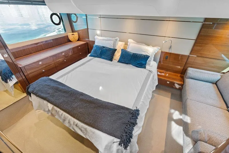 Slide: The Image of Luxurious bedroom interior of 2016 Princess 60 Flybridge Motor Yacht with elegant furnishings. - 39
